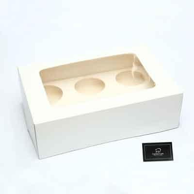 תמונה של קופסא לבנה קטנה לעוגה/קאפקייקס